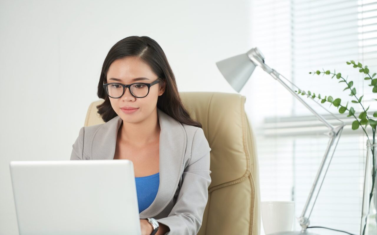 Filipino executive virtual assistant working in office