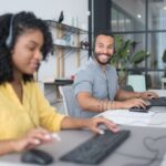 Customer support team working together in a modern office
