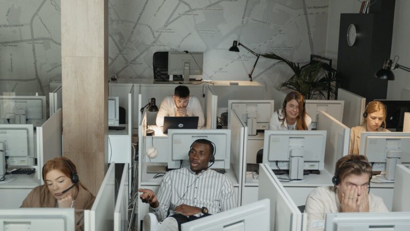 Offshore call center floor with agents at workstations