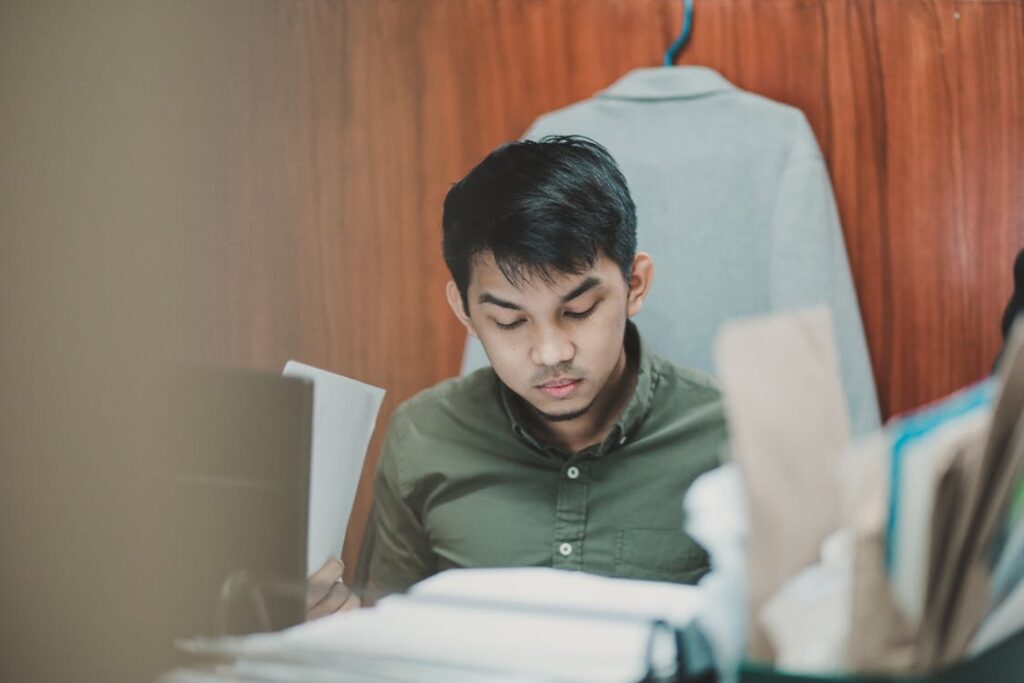 Filipino office professional working at desk — virtual assistant talent pool