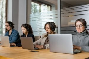 A team handling outsourced business operations in a BPO office