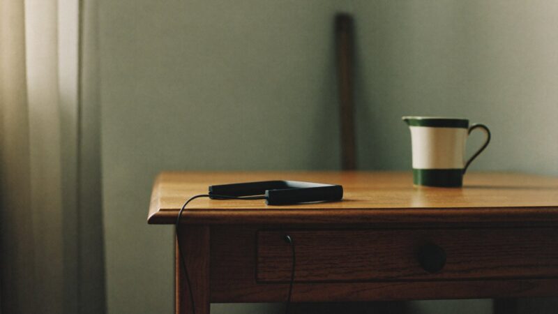 Wireless headset on a tidy desk, best outsourced SDR companies