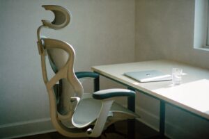 Dedicated desk with a closed laptop, staff augmentation for non-tech teams