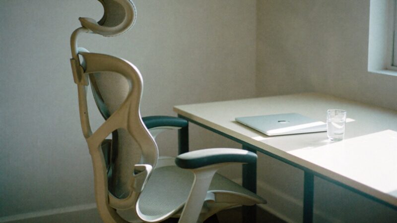 Dedicated desk with a closed laptop, staff augmentation for non-tech teams